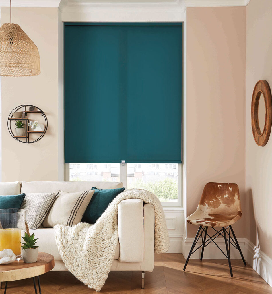 photo of living room with sofa in front of window 