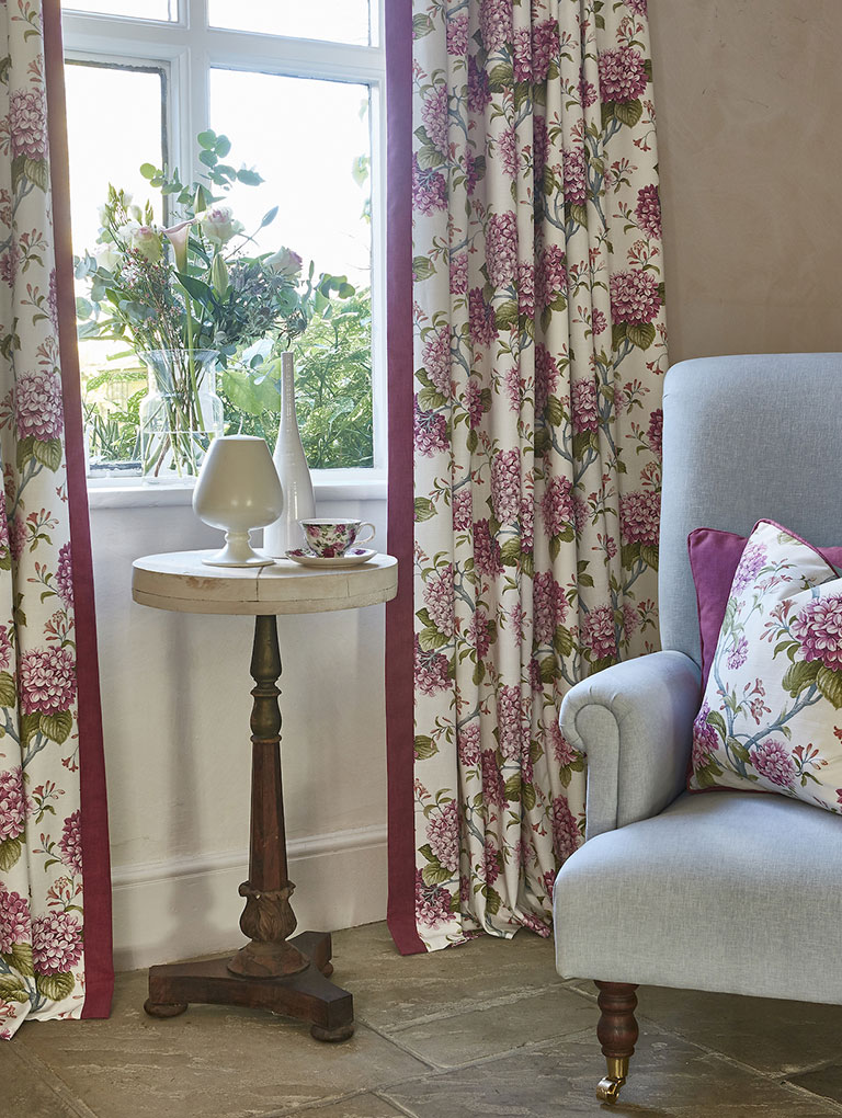 Vintage floral patterns in a living room window 