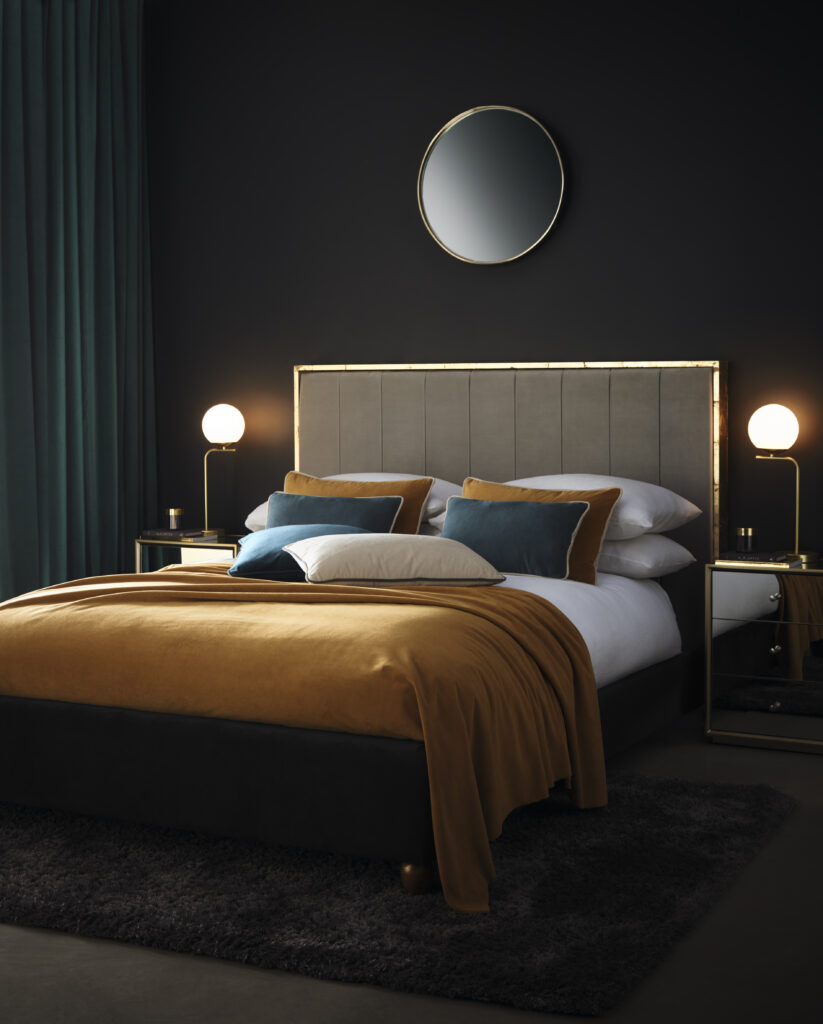 Mustard accessories in a dark bedroom