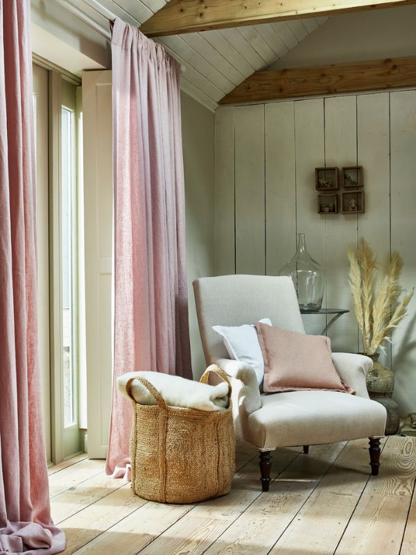 A perfect pink comfortcore window with comfy chair and cushions