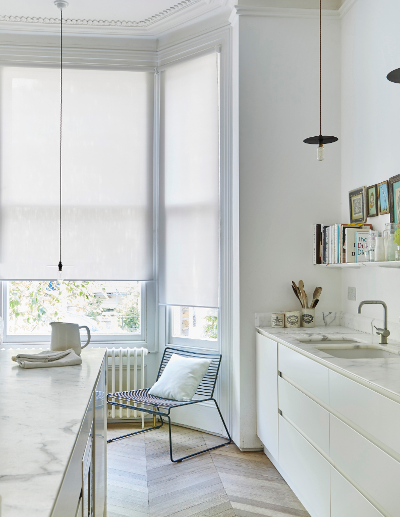 White Blinds in Kitchen.
