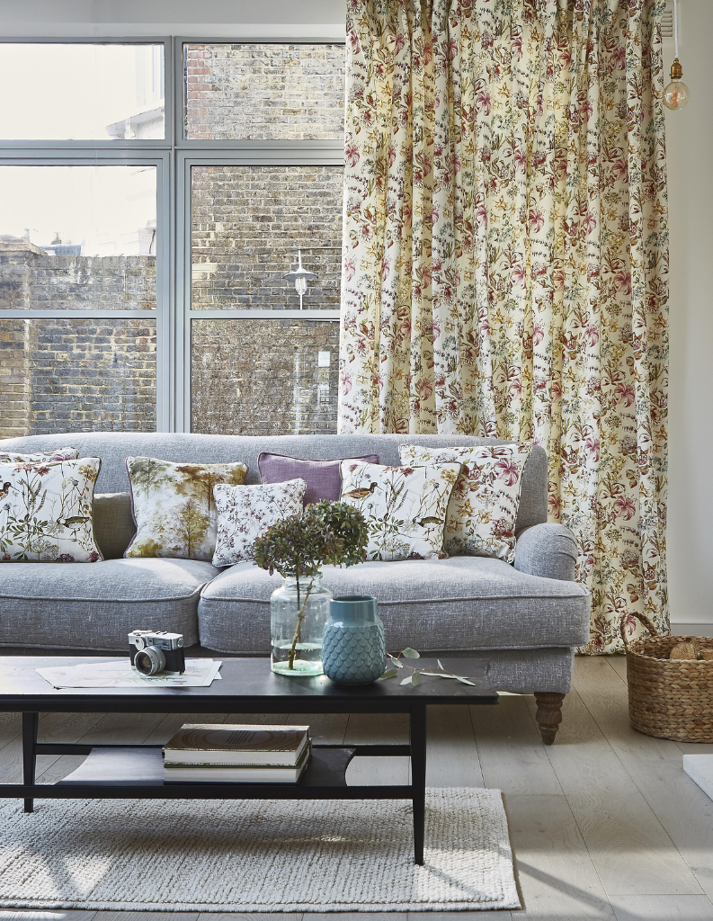 Floral cotton curtains in a beautiful living room. 
