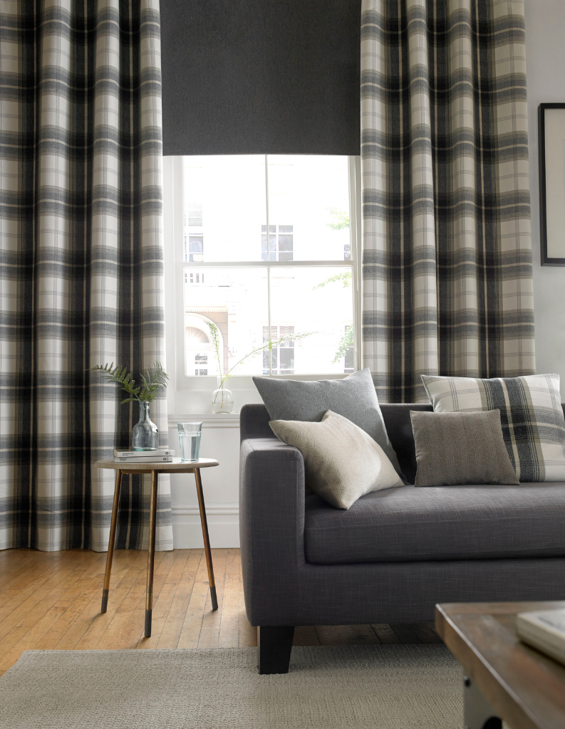 Checked wool effect curtains in a grey and cream living room.