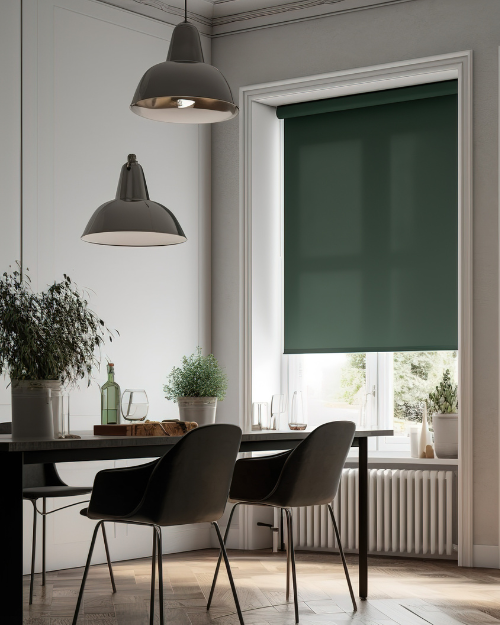 Green roller blinds in dining room.